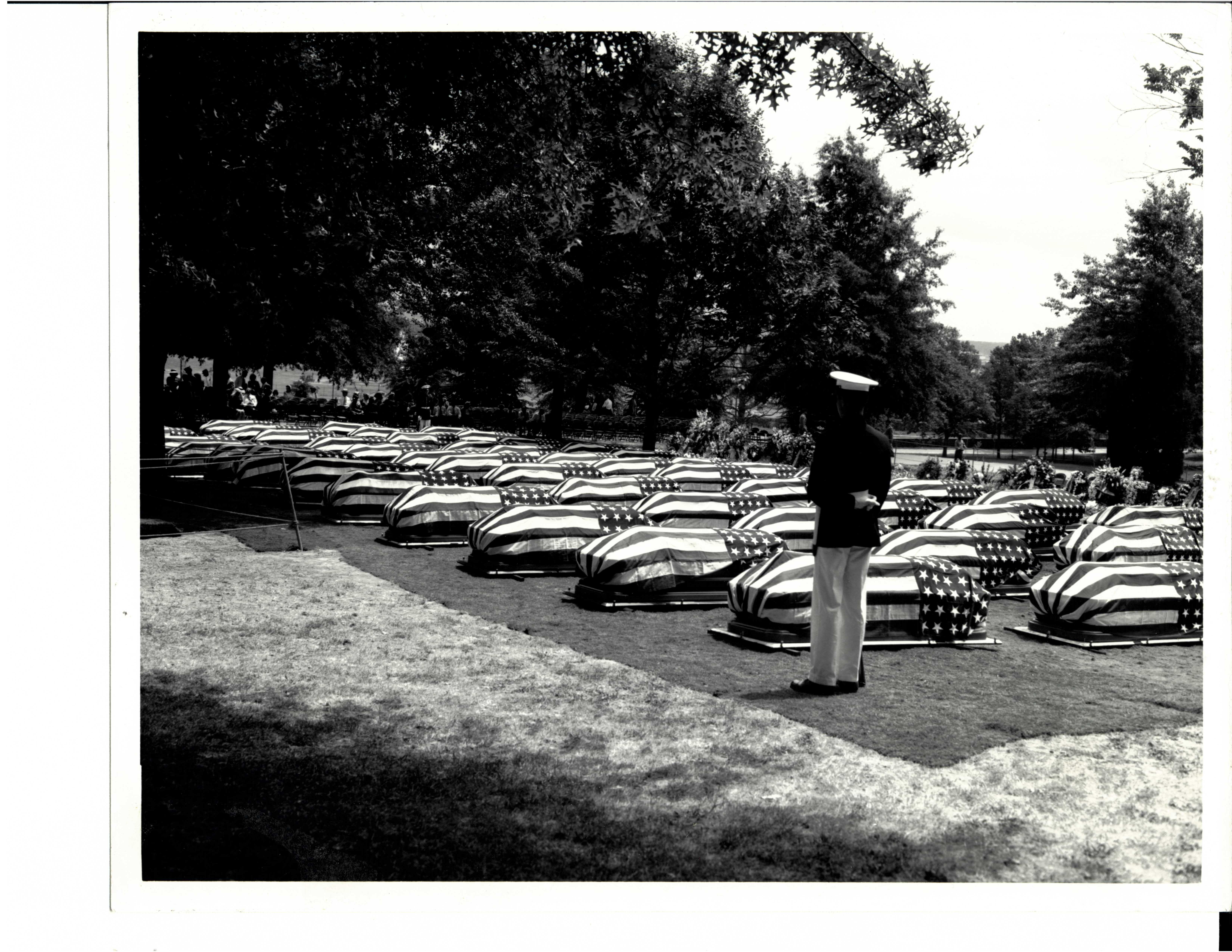 The Serpens caskets flag-draped for formal interment ceremony at Arlington National Cemetery. (U.S. Coast Guard) The Serpens caskets flag-draped for formal interment ceremony at Arlington National Cemetery. (U.S. Coast Guard)